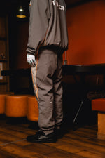 TNRCN NYLON SETUP PANTS KHAKI